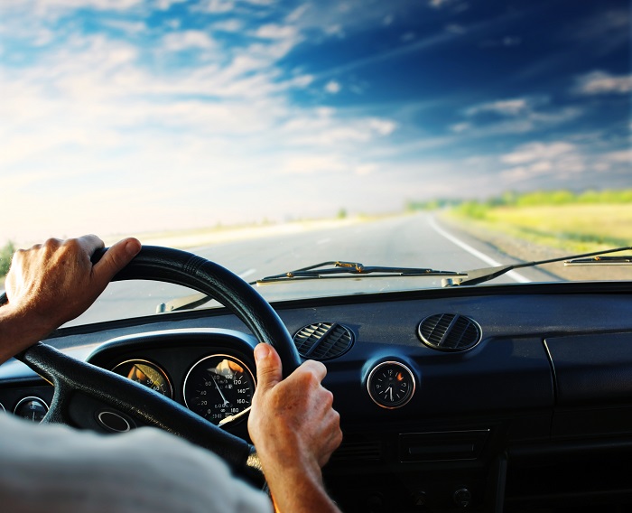 Driver Driver's hands on steering wheel