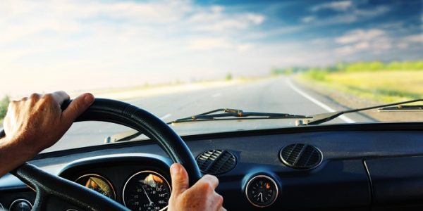 Driver Driver's hands on steering wheel